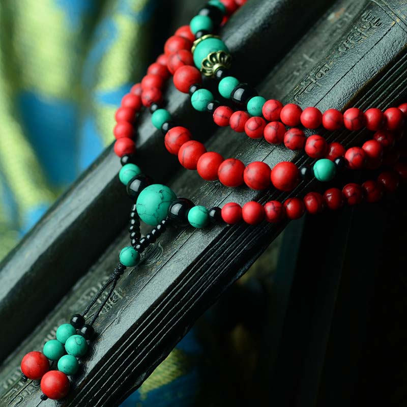 Braccialetto di protezione con perline di turchese rosso e onice nero Buddha Stones - Image 5