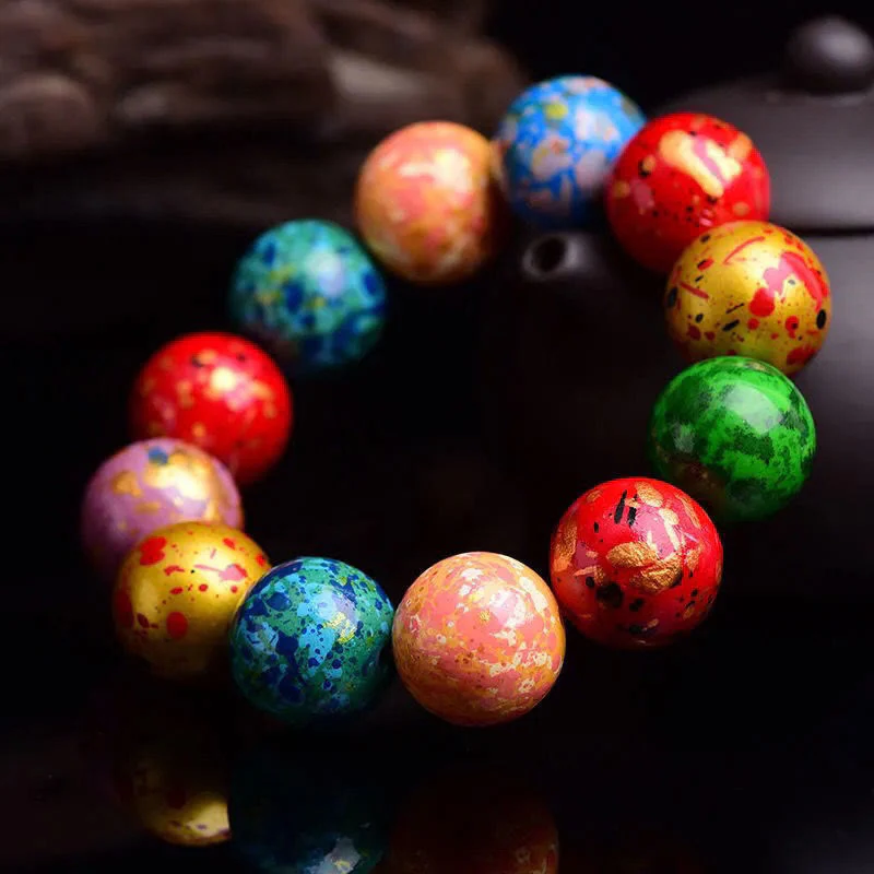 Braccialetto di protezione con perline in legno di sandalo lavorato a mano con Buddha Stones multicolore e lacca