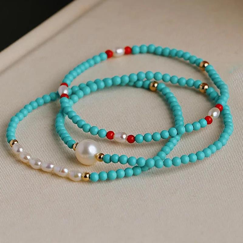 Braccialetto di protezione con piccole perle di agata rossa e turchese Buddha Stones - Image 2