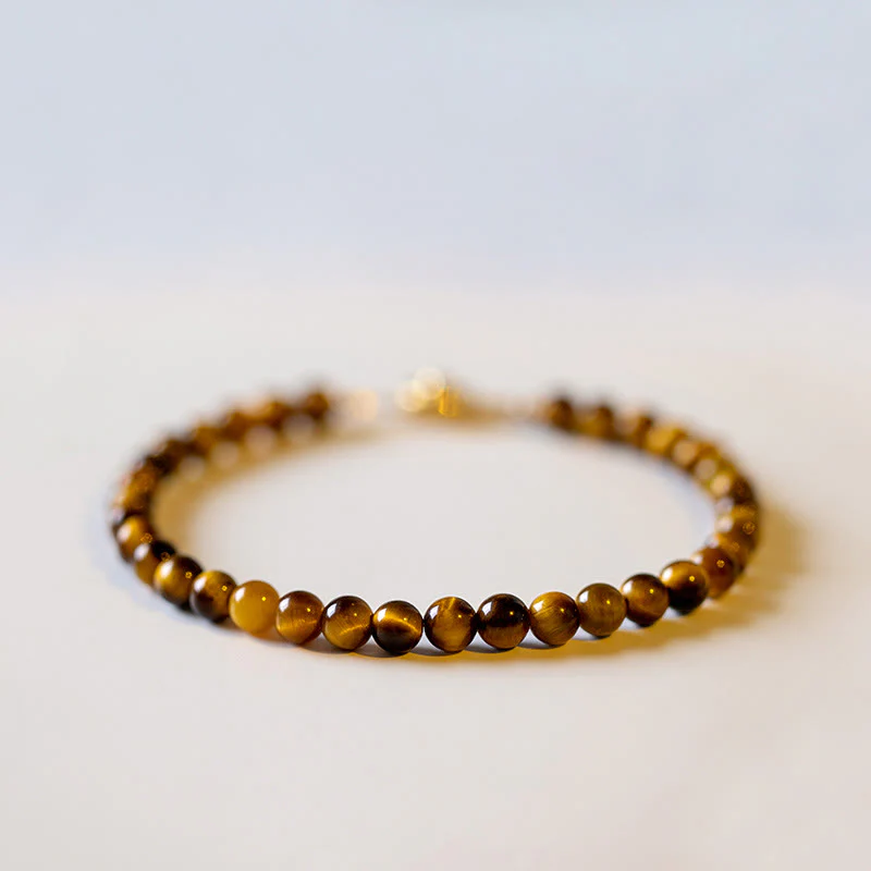 Braccialetto di protezione del coraggio in pietra naturale occhio di tigre placcato oro 14K Buddha Stones