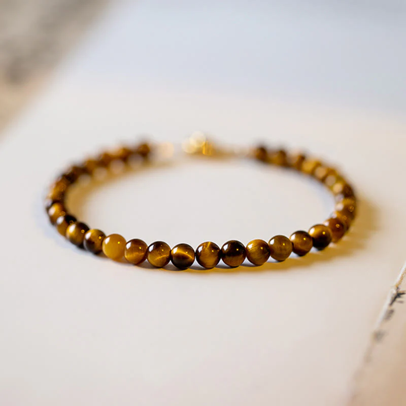Braccialetto di protezione del coraggio in pietra naturale occhio di tigre placcato oro 14K Buddha Stones - Image 12