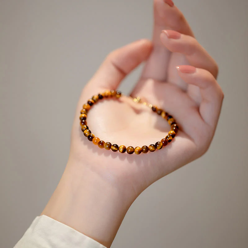Braccialetto di protezione del coraggio in pietra naturale occhio di tigre placcato oro 14K Buddha Stones - Image 9
