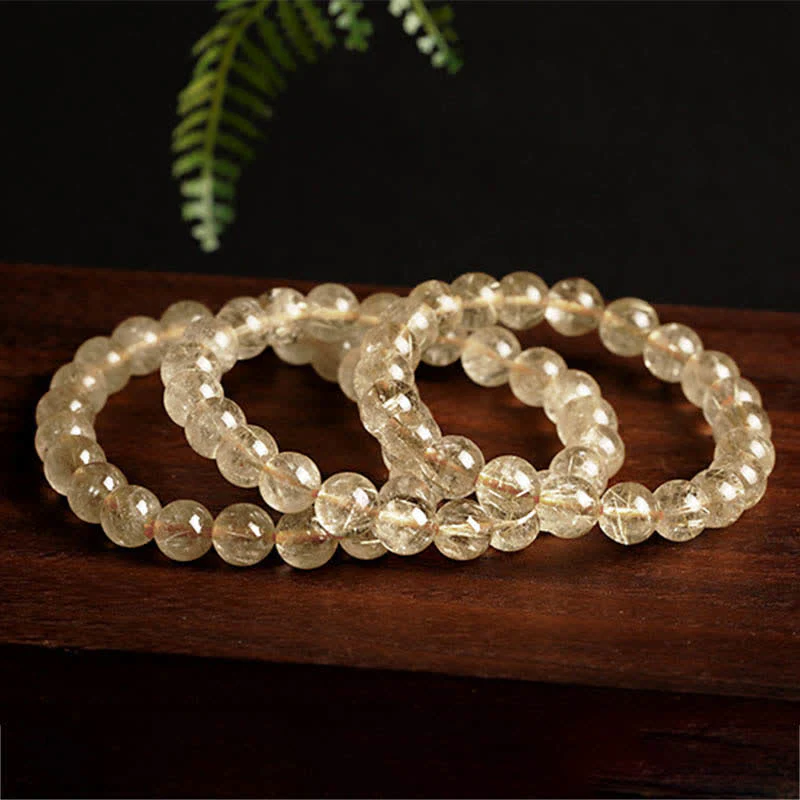 Braccialetto di protezione e buon auspicio in quarzo rutilato naturale Buddha Stones - Image 5