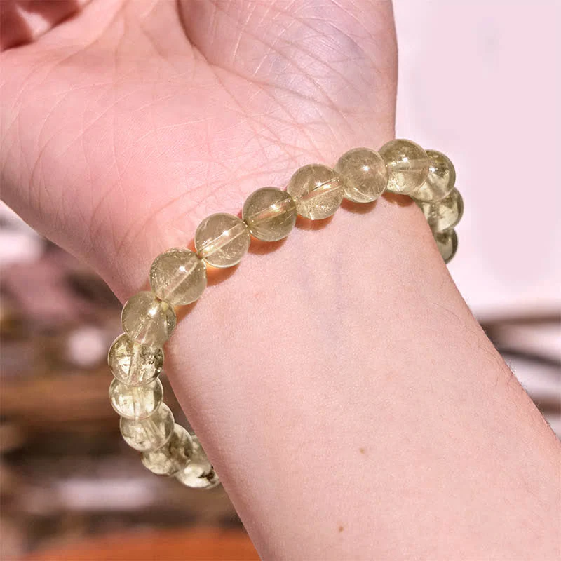 Braccialetto di protezione e buon auspicio in quarzo rutilato naturale Buddha Stones - Image 9