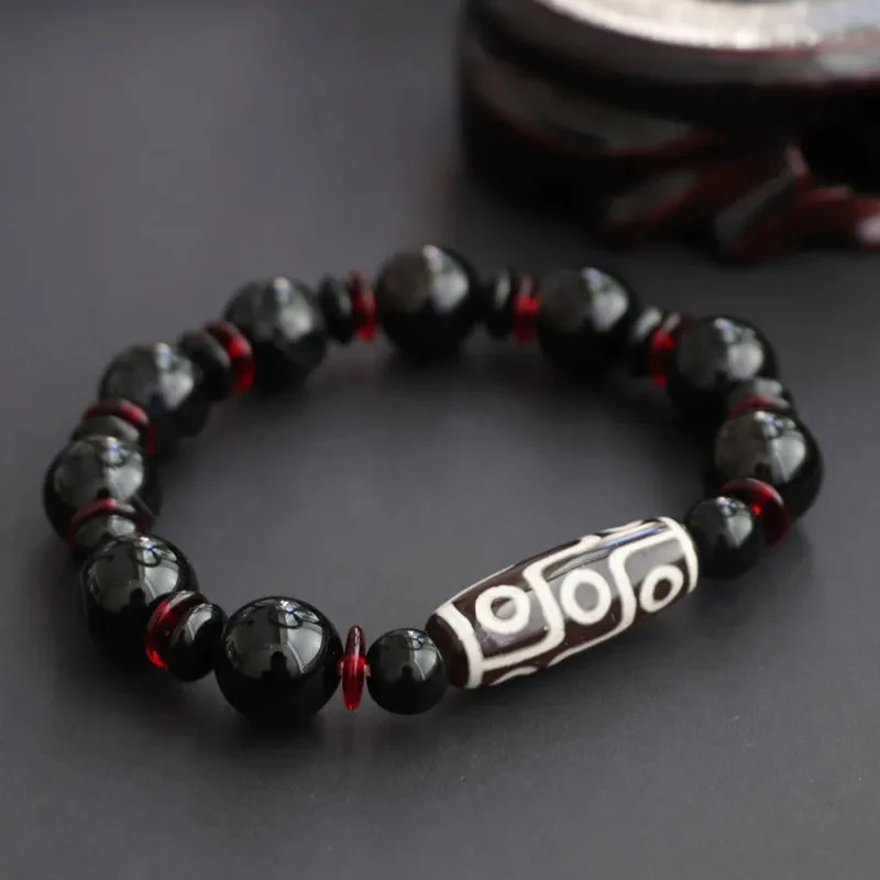 Braccialetto di protezione della ricchezza con perline Dzi a nove occhi in onice nero Buddha Stones