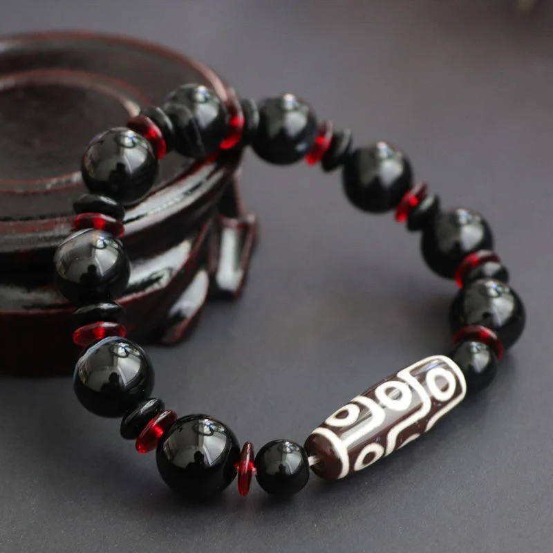 Braccialetto di protezione della ricchezza con perline Dzi a nove occhi in onice nero Buddha Stones - Image 2