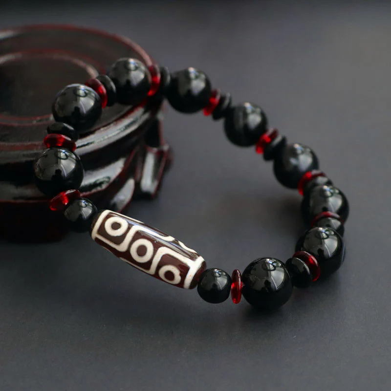 Braccialetto di protezione della ricchezza con perline Dzi a nove occhi in onice nero Buddha Stones - Image 4