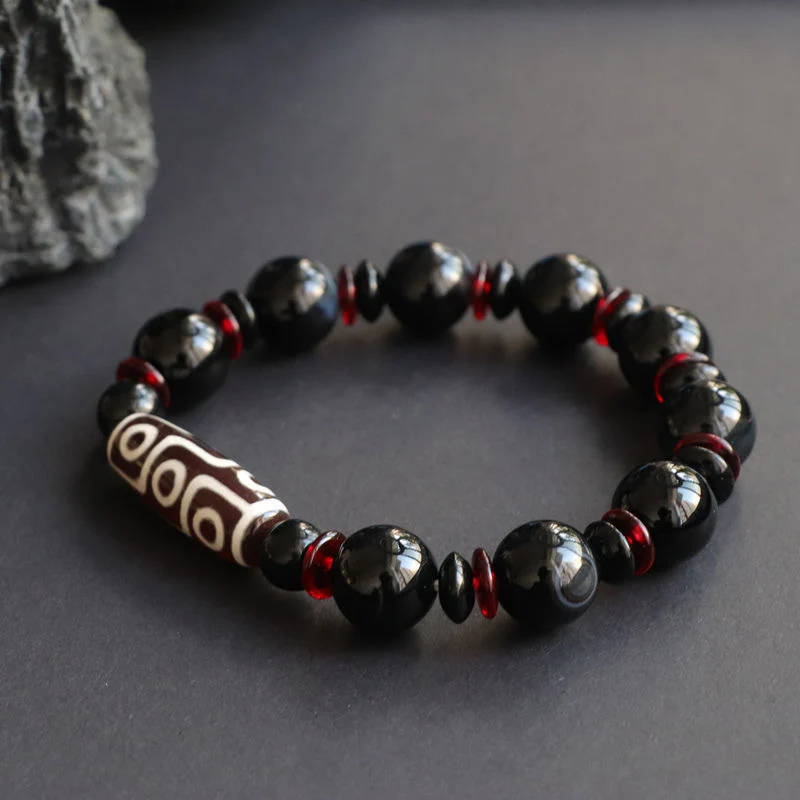 Braccialetto di protezione della ricchezza con perline Dzi a nove occhi in onice nero Buddha Stones - Image 6