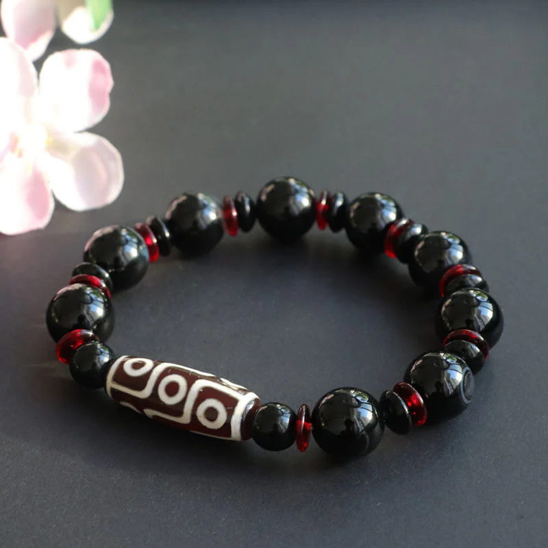 Braccialetto di protezione della ricchezza con perline Dzi a nove occhi in onice nero Buddha Stones - Image 7