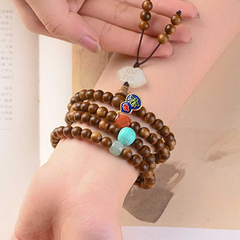 Braccialetto di protezione e calma in palissandro tibetano Buddha Stones Mala - Image 7