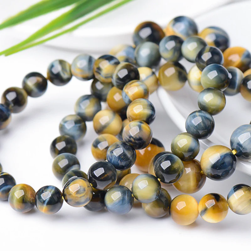 Braccialetto di protezione e forza con occhio di tigre Buddha Stones - Image 9