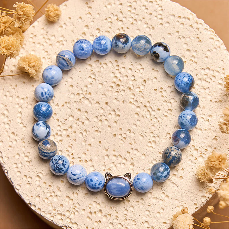 Braccialetto di protezione in agata blu e cianite con testa di gatto naturale Buddha Stones - Image 2