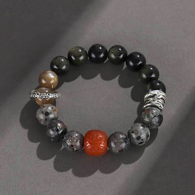 Braccialetto di protezione in agata rossa, ossidiana, pietra lavica e pietre dorate Buddha Stones - Image 2