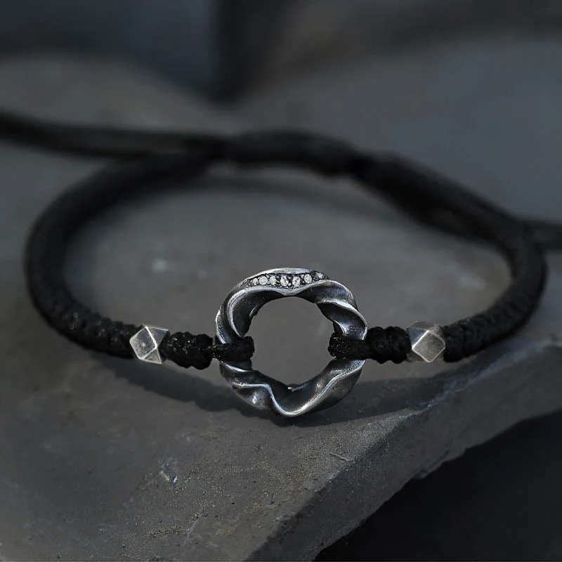 Braccialetto di protezione in corda di cera nera con fibbia della pace in argento sterling 999 Buddha Stones