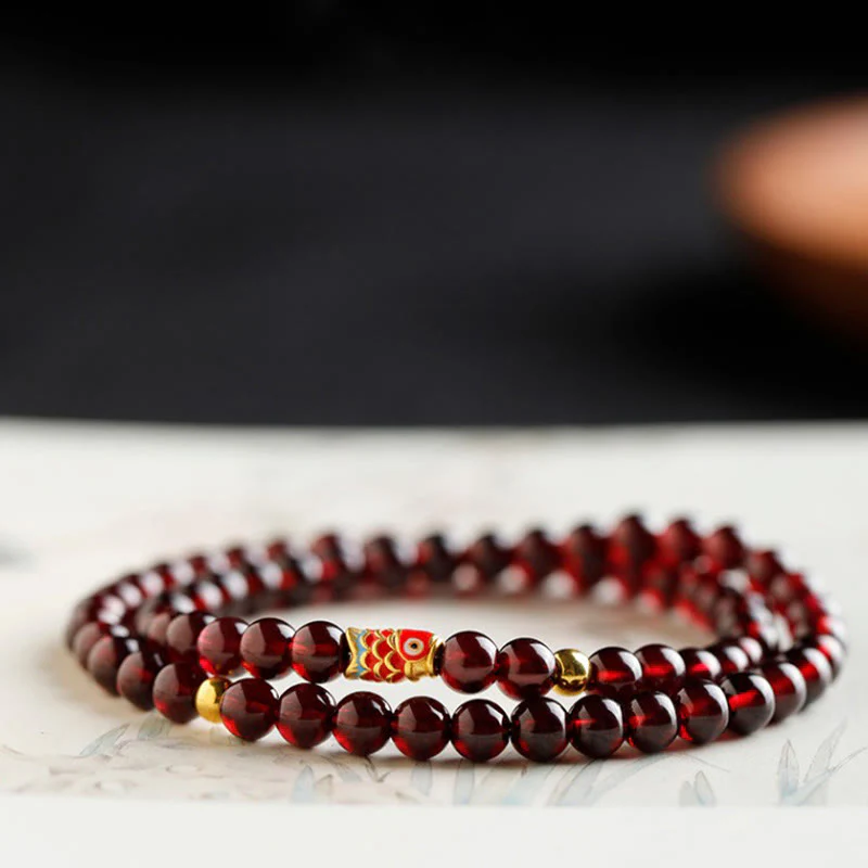 Braccialetto di protezione in granato naturale con pesce koi in oro 999 Buddha Stones - Image 17