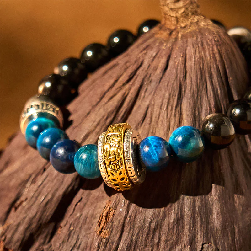 Braccialetto di protezione in occhio di tigre blu ossidiana e argento lucido Buddha Stones - Image 4