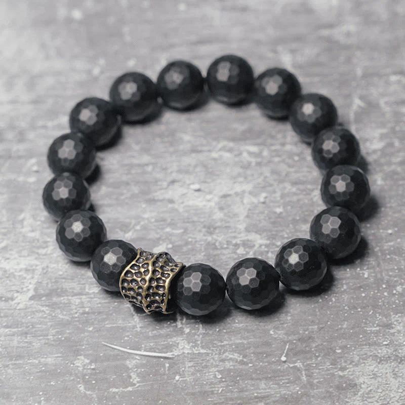 Braccialetto di protezione in ottone e rame con onice nero opaco Buddha Stones