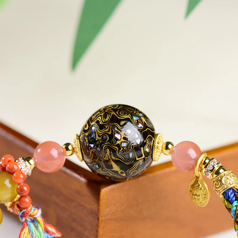 Braccialetto di protezione in pietra di occhio di tigre intrecciato a mano con perline di lacca tibetana Buddha Stones - Image 11
