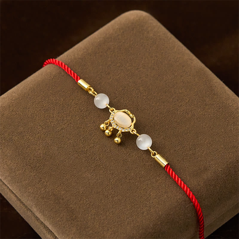 Braccialetto di protezione in rame placcato oro con ciondolo a forma di lucchetto cinese Buddha Stones filo rosso occhio di gatto - Image 3