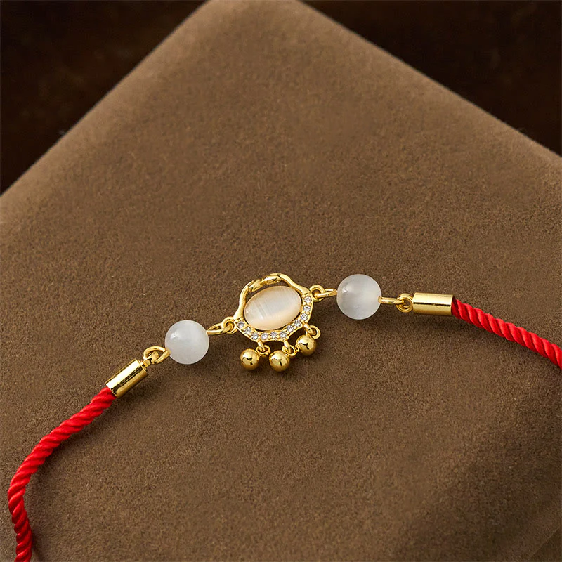 Braccialetto di protezione in rame placcato oro con ciondolo a forma di lucchetto cinese Buddha Stones filo rosso occhio di gatto - Image 4