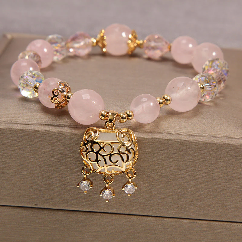Braccialetto di protezione lenitiva in cristallo rosa naturale Buddha Stones