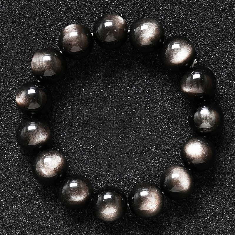 Braccialetto di protezione lenitiva in ossidiana lucida d'argento naturale Buddha Stones