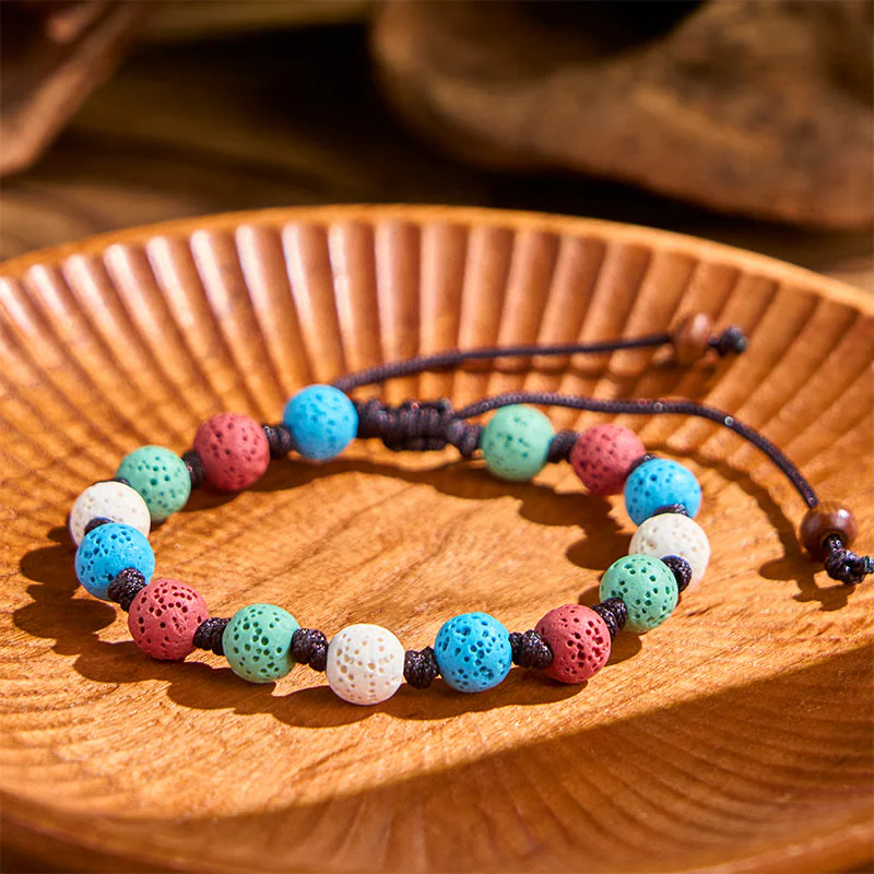 Braccialetto di supporto in pietra lavica colorata Buddha Stones - Image 13