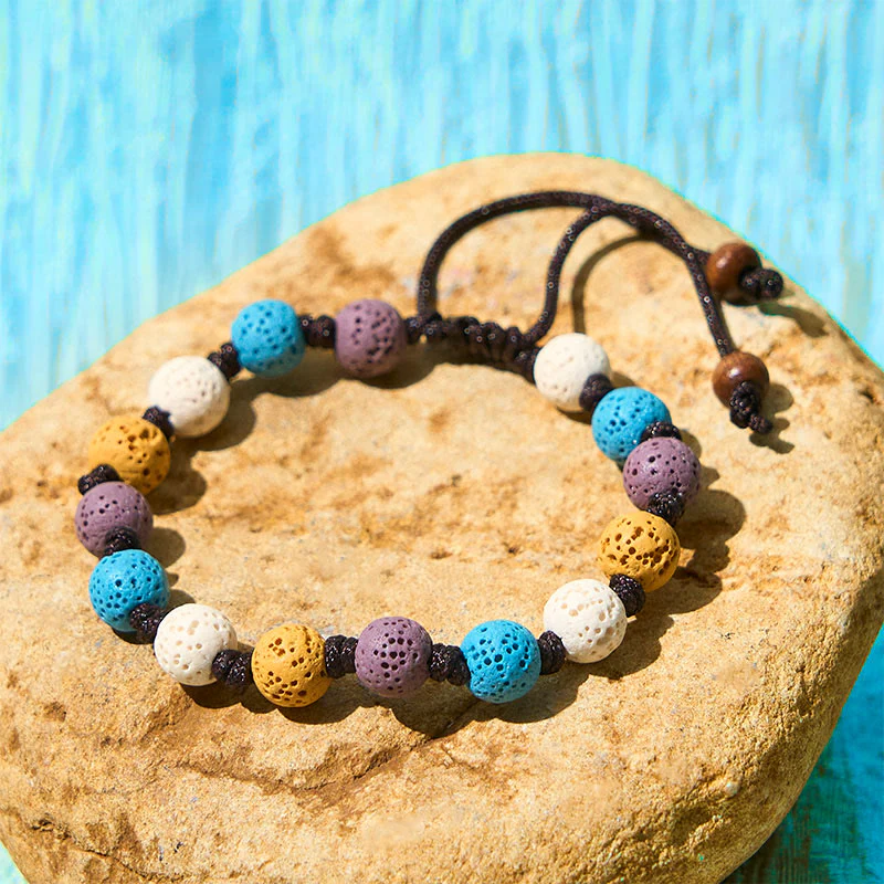 Braccialetto di supporto in pietra lavica colorata Buddha Stones - Image 15