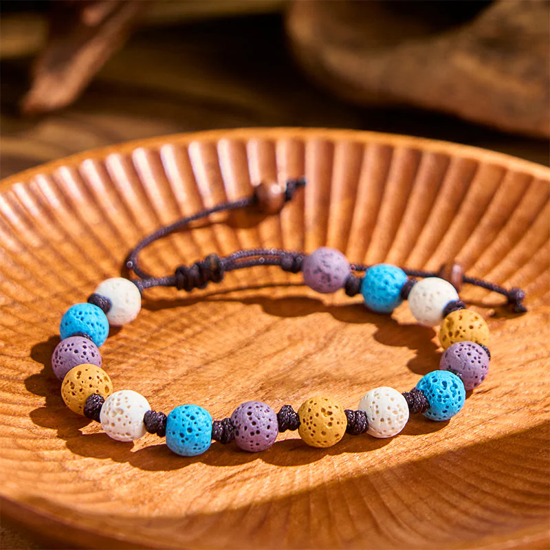 Braccialetto di supporto in pietra lavica colorata Buddha Stones - Image 16
