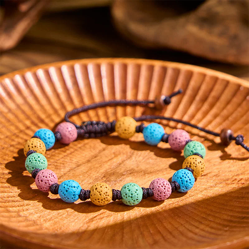 Braccialetto di supporto in pietra lavica colorata Buddha Stones - Image 9
