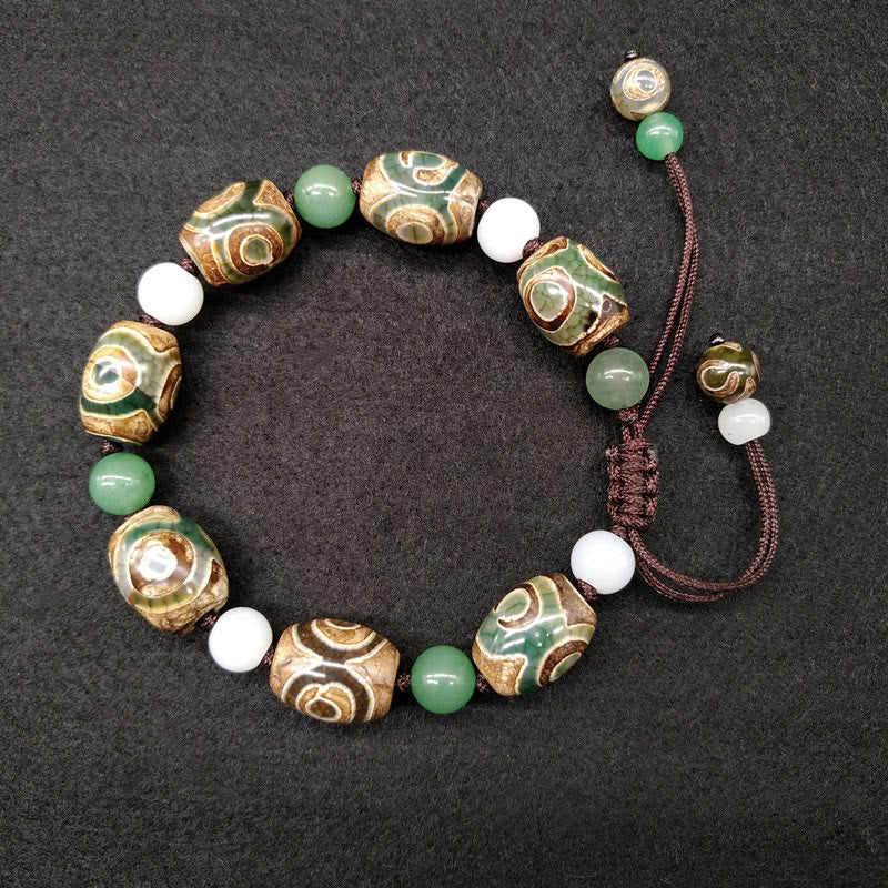 Braccialetto intrecciato con Buddha Stones Dzi tibetane a tre occhi e protezione dalla fortuna