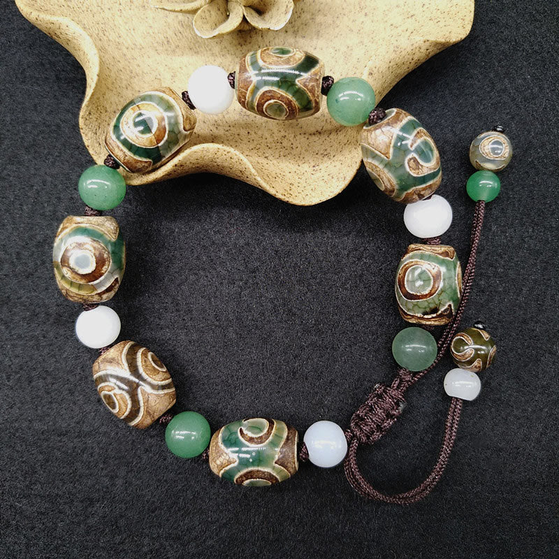 Braccialetto intrecciato con Buddha Stones Dzi tibetane a tre occhi e protezione dalla fortuna - Image 2