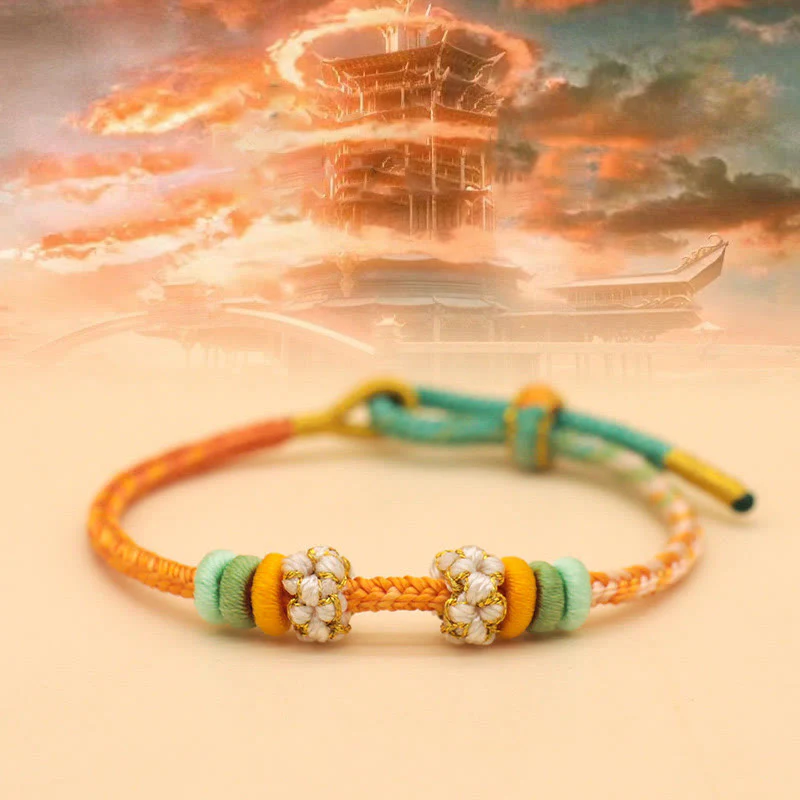 Braccialetto intrecciato con corda Buddha Stones a forma di nodo della pace a otto fili fatto a mano con nodo di fiori di pesco - Image 8