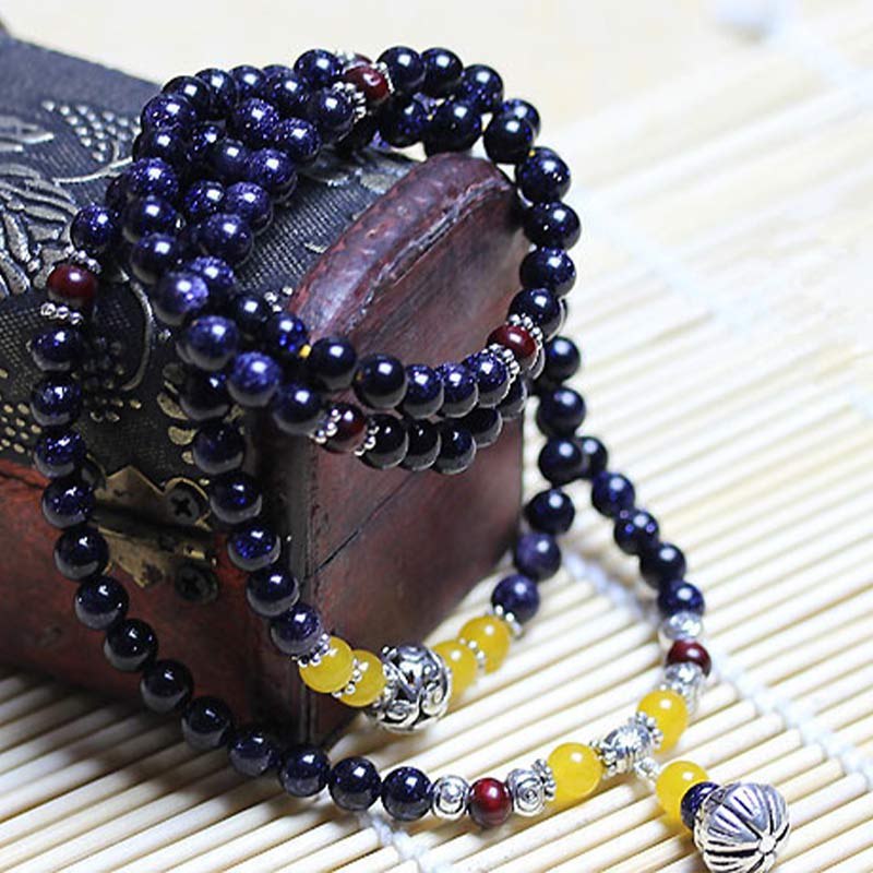 Braccialetto Mala con ciondolo di ricchezza in arenaria blu Buddha Stones - Image 3