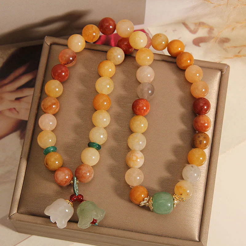 Braccialetto portafortuna a doppio strato con campanella e orchidea in seta dorata naturale del Tibet, Buddha Stones - Image 8