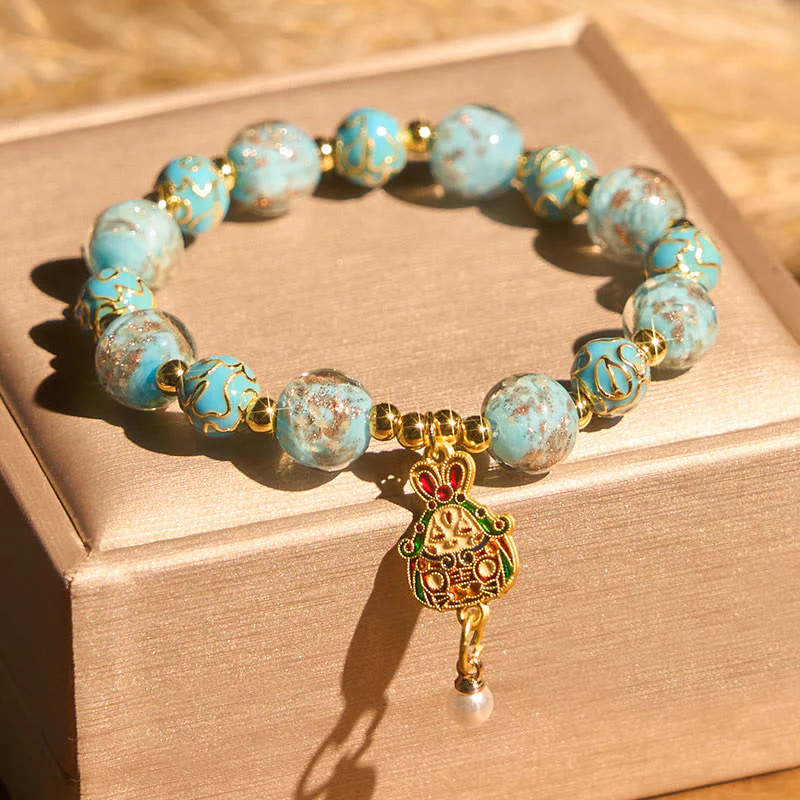 Braccialetto portafortuna in vetro Liuli con coniglio Buddha Stones