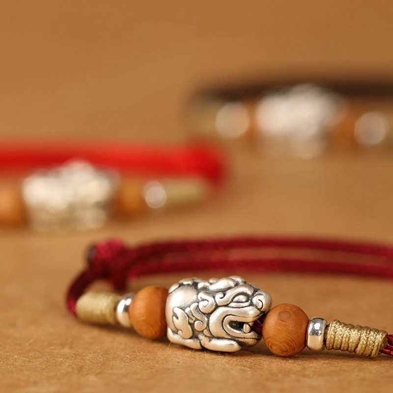 Braccialetto portafortuna intrecciato a mano con perline in legno di pesca, in argento sterling 999, con ciondolo Pixiu Buddha Stones - Image 4