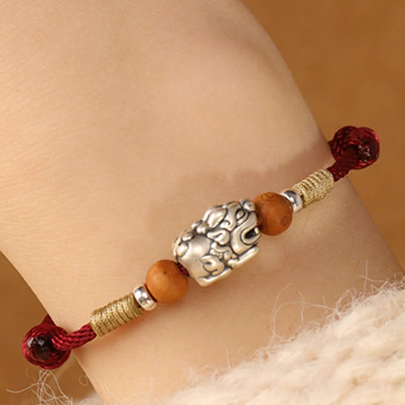 Braccialetto portafortuna intrecciato a mano con perline in legno di pesca, in argento sterling 999, con ciondolo Pixiu Buddha Stones - Image 7
