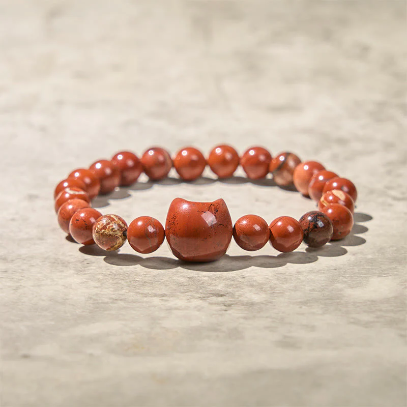 Braccialetto portafortuna turchese rosso con testa di gatto senza volto di Buddha Stones - Image 5