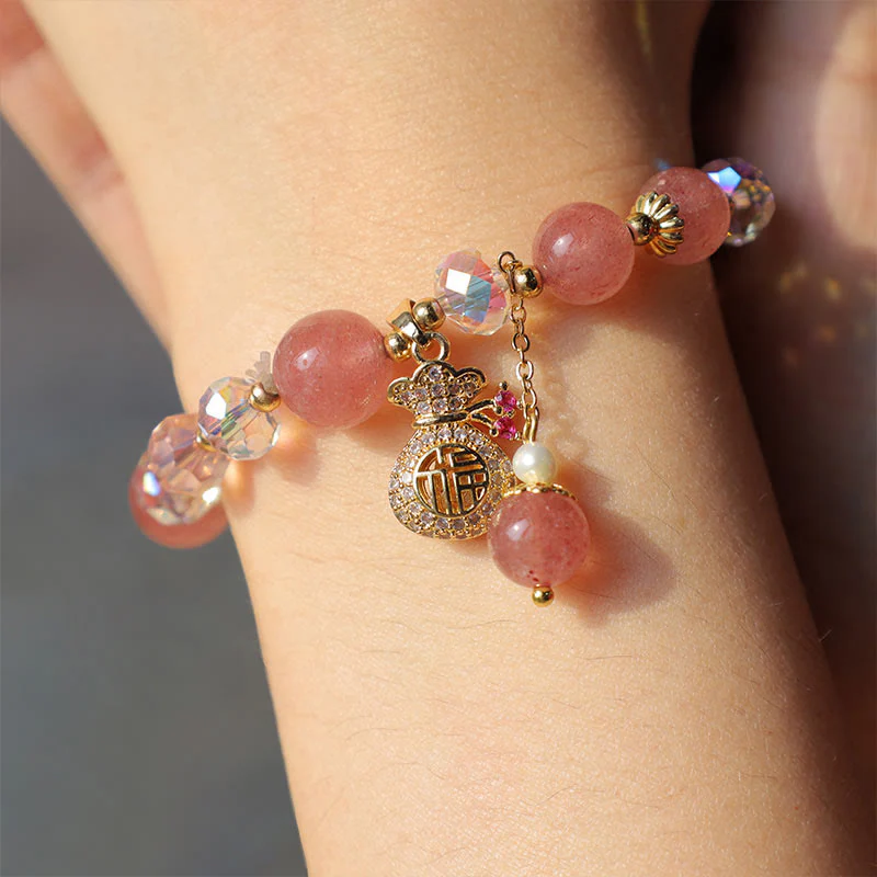 Braccialetto positivo con ciondolo a forma di sacchetto di denaro in cristallo di quarzo fragola naturale Buddha Stones - Image 3