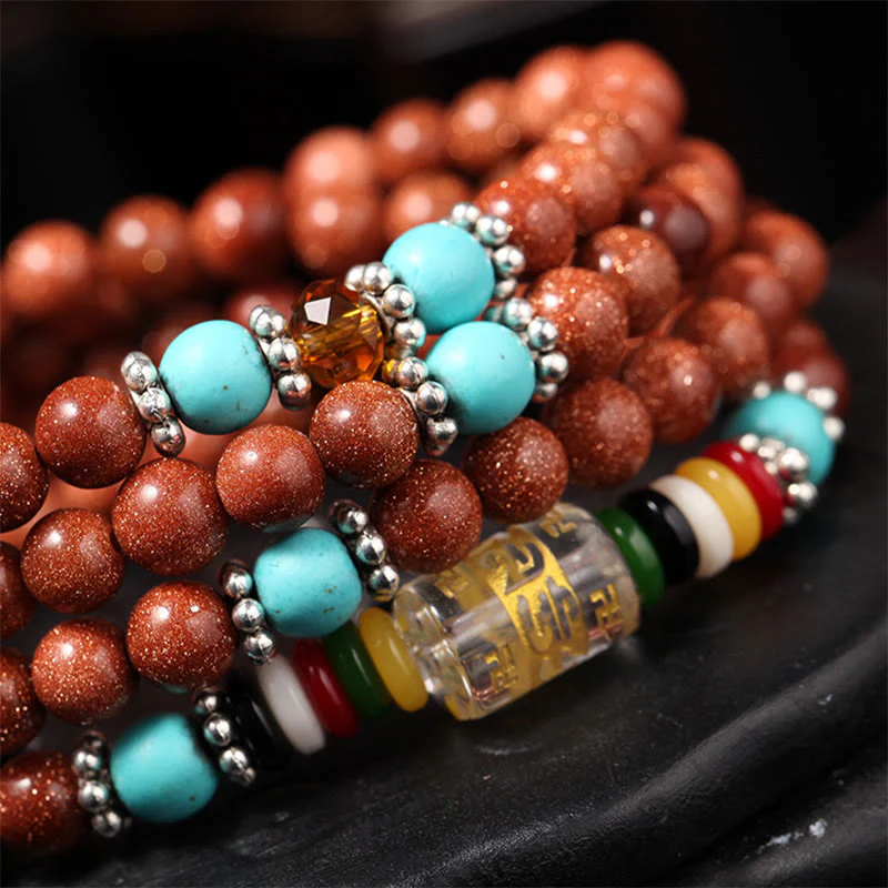 Buddha Stones 108 Mala Beads Goldstone Om Mani Padme Hum Swastika Braccialetto di Fiducia - Image 4