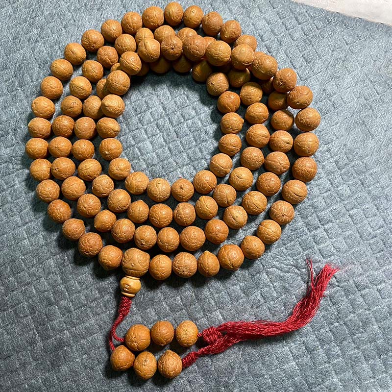 Buddha Stones 108 Mala Beads Nepal Bodhi Seed Fortuna Ricchezza Braccialetto con Nappa