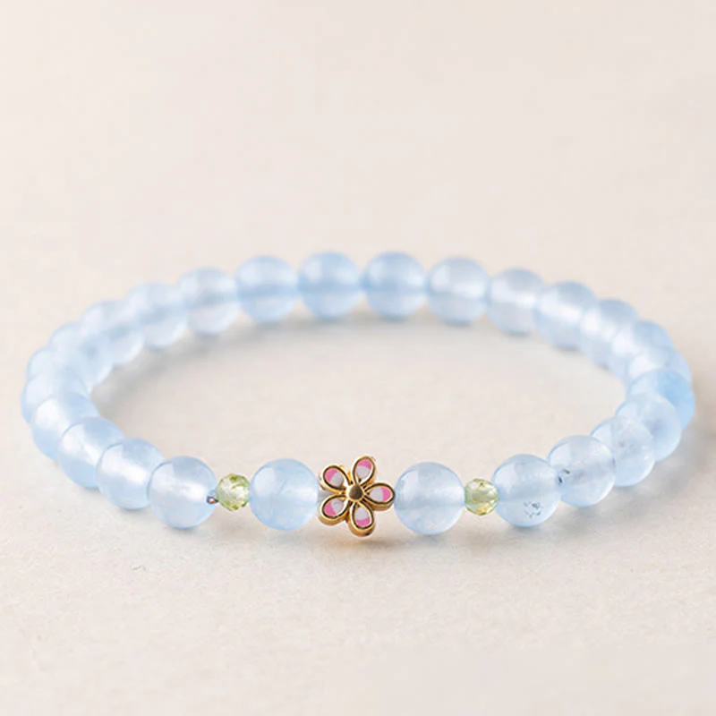 Buddha Stones Bracciale terapeutico floreale in rame placcato oro e acquamarina naturale