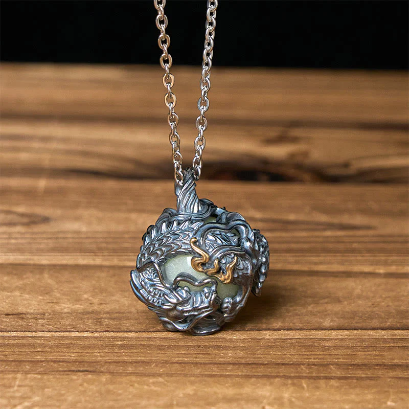 Buddha Stones Collana con ciondolo a forma di drago di rame che circonda la perla della forza