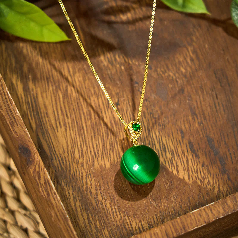 Buddha Stones Collana con ciondolo a forma di palla rotonda con occhio di gatto e simbolo di fiducia - Image 15