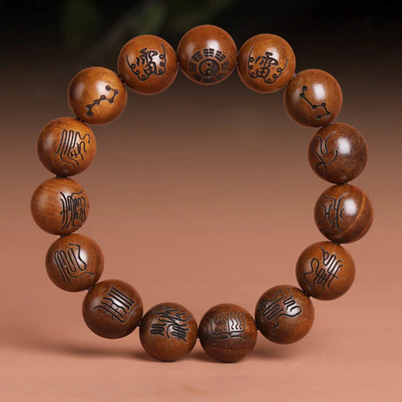 Buddha Stones Fulmine Colpito Legno di Giuggiola Yin Yang Bagua Taoista Tabù Scrittura Simbolo Braccialetto della Fortuna Inciso