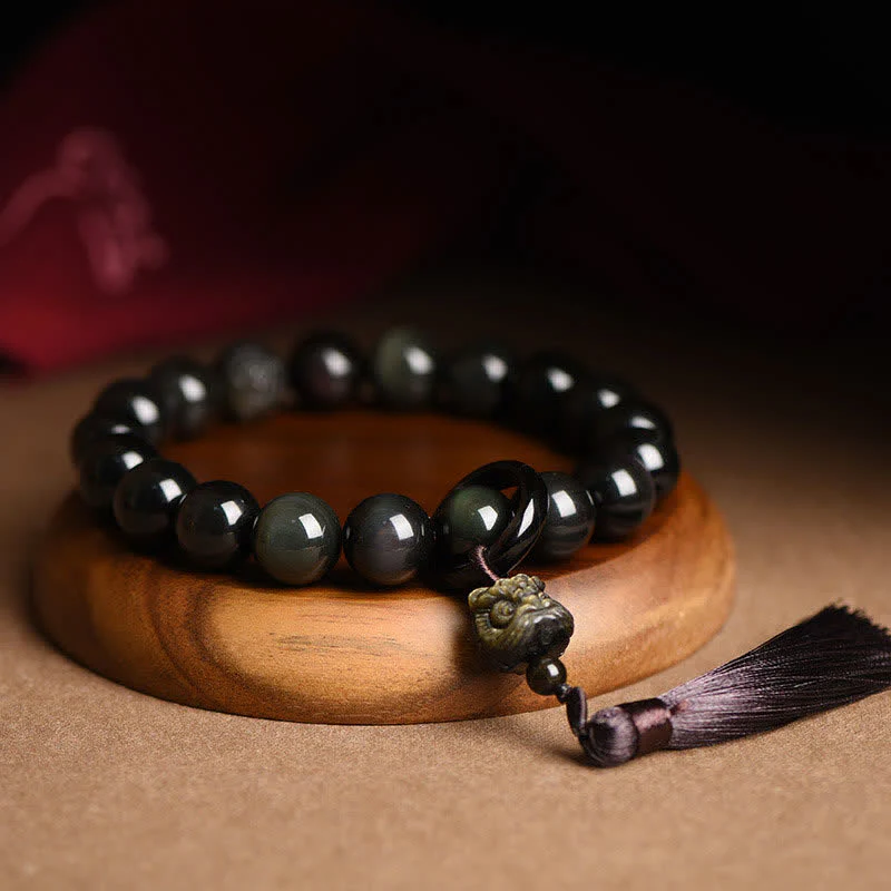 Buddha Stones Ossidiana nera naturale Leone Mala da polso Protezione Nappe Mala tascabile Decorazione per auto
