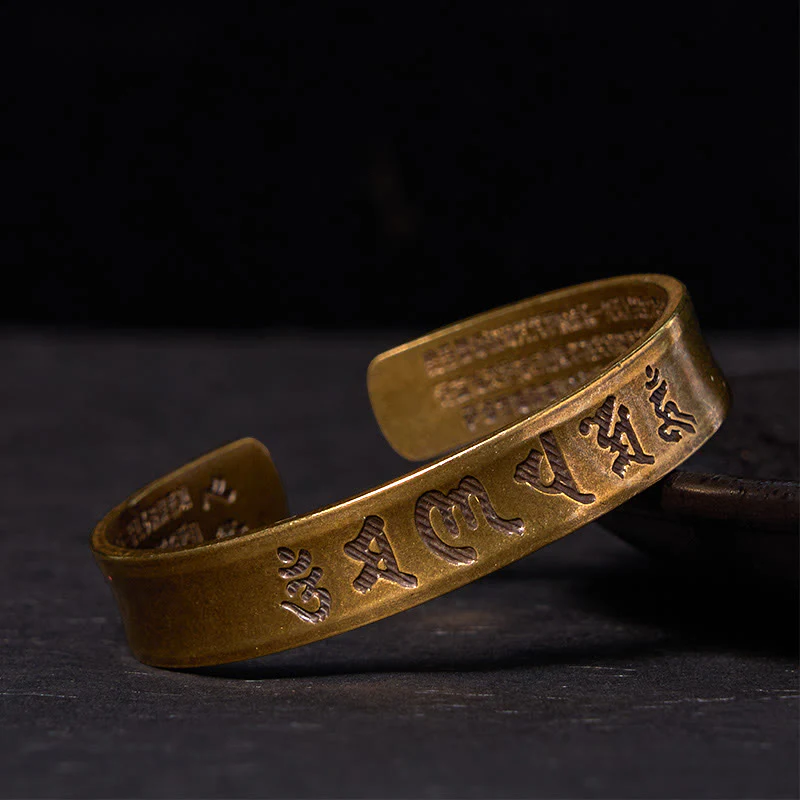 Buddha Stones Sei parole vere 'om Mani Padme Hum' Sutra del cuore Bracciale rigido in ottone e rame per la pace interiore