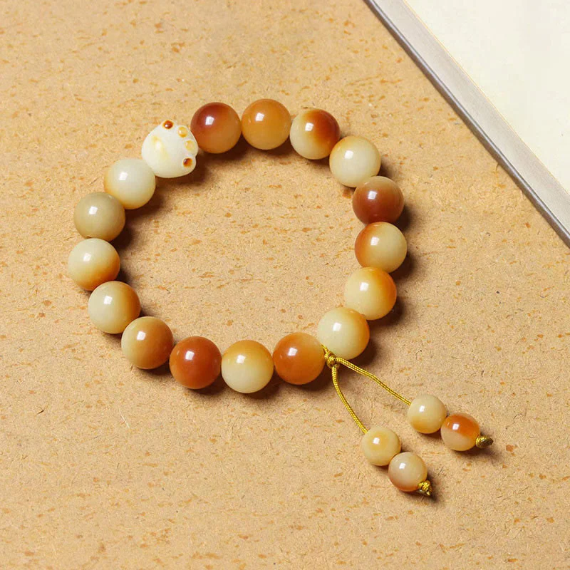 Buddha Stones Semi di Bodhi naturali Braccialetto di saggezza della pace con artigli di zampa adorabile