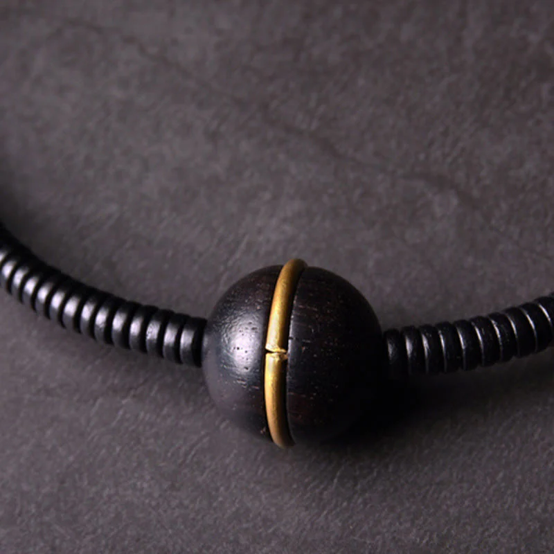 Collana con bracciale a doppio giro in Buddha Stones, in legno di ebano, in ottone e rame, con sfera di equilibrio cubica - Image 2